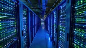 What is the 100 MW rule, and why are future US data centers moving to liquid cooling by July 